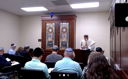 Rabbi Rudnick leading services