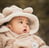 a family photo of a baby looking up
