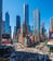 a city street scene with a lot of people walking around in USA