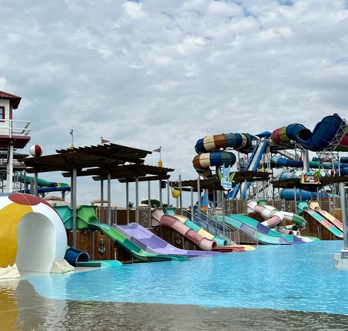 a large water park with a water slides