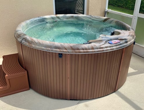 a hot tub on patio deck