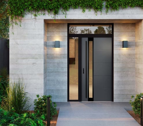 a modern home entrance with a modern door