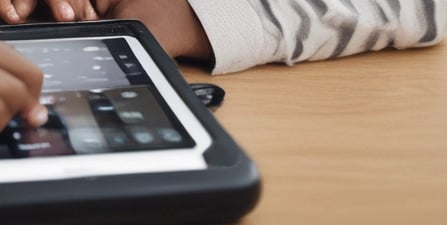 black kids using AAC device