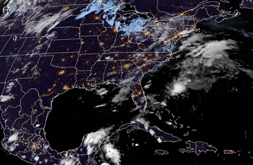 NOAA GeoColor satellite image over most of CONUS and portions of Caribbean and Mexico. At night shows city lights and clouds.
