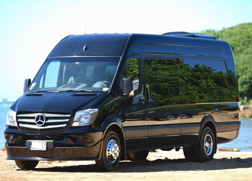 a black van parked on the beach