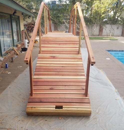 Fabrication of 20ft long wooden bridge for the swimming pool