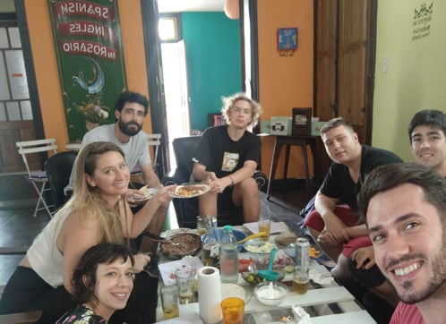 A group of people enjoying a meal together at a dining table