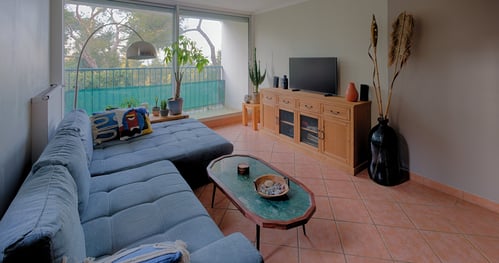 a living room with a couch and a television