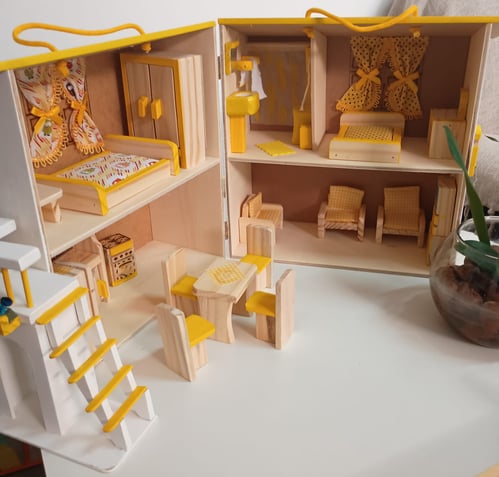 a doll house with a doll house inside