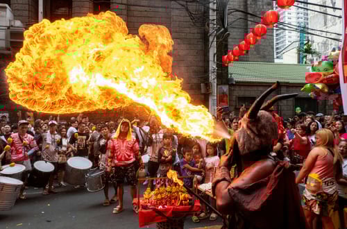 Fire Breathing Devotee in a Manila Festival
