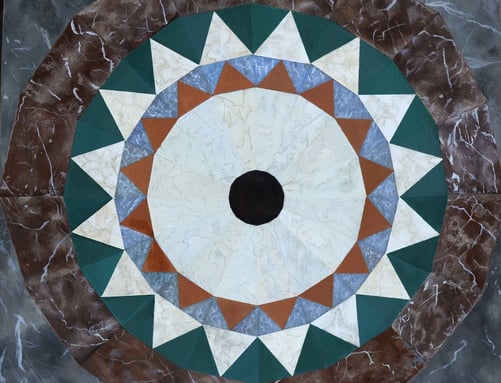 Acrylic painting including details of marble floor mosaic in shape of mandela 