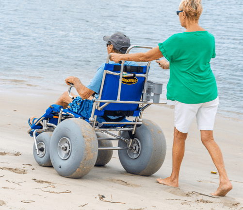 Using a beach wheelchair in the beach in Thailand. Making our beach accessible.