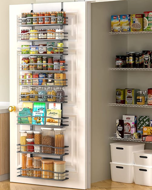 a pantry door with a pantry door open