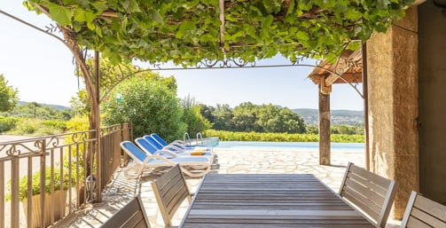 a patio table with chairs and a table