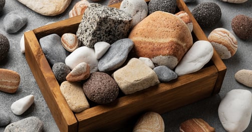 wooden box with rocks