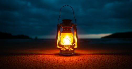 Latern on ground glowing in dark
