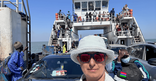 Zayera on a ferry border crossing Senegal to Gambia