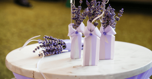 wedding table with a bunch of lavender flowers