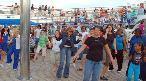 Sheila and Lady at the sail away party on Carnival Glory