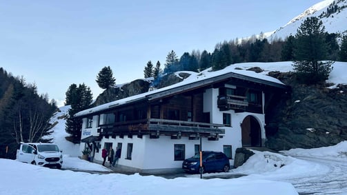 a house with a mountain view in austria
