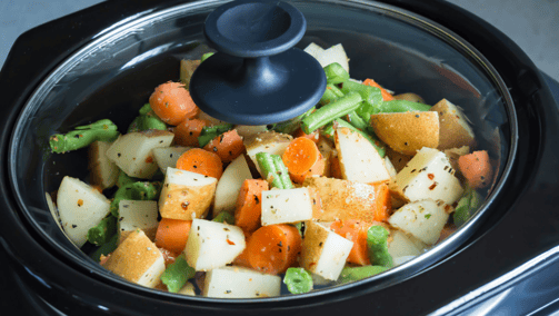 a potted potted with vegetables in a slow cooker