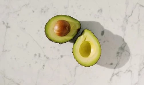 sliced-green-fruit-on-white-surface