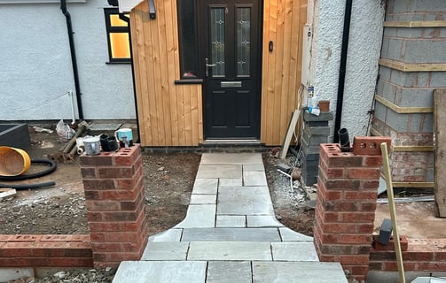 brick wall being built at a malvern home