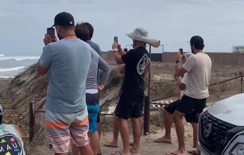 Group of people taking pictures