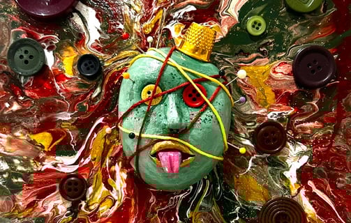a painting of a face with buttons and buttons