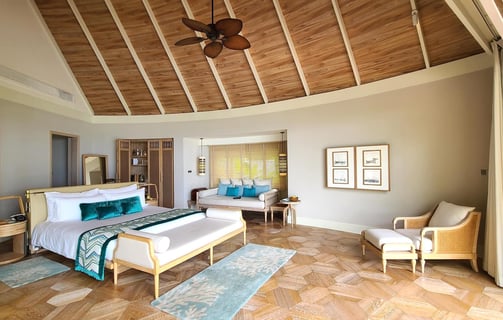 Milaidhoo Maldives beach villa bedroom