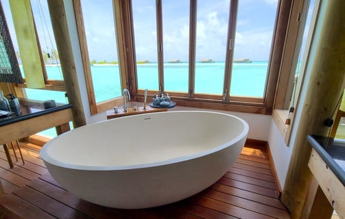 Gili Lankanfushi overwater villa bath