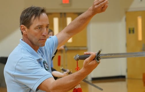 Johnny practicing the Combined 42 Tai Chi Sword form at the Tai Chi for Health annual workshop.