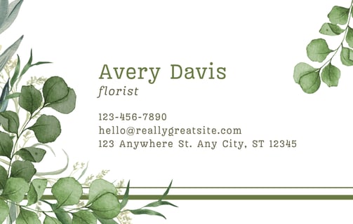 a business card with a floral border and a floral border