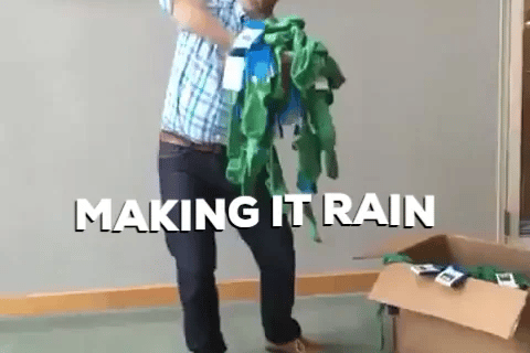 a man in a green shirt and a green shirt with a green hat on it