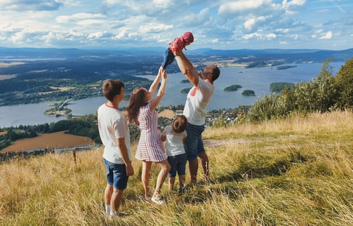 a family of four children playing in photosession