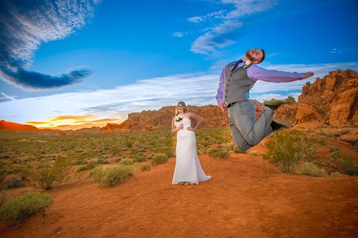 a man and woman are posing for a photo