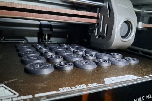 Custom parts in ASA (ABS like material) being manufactured on one of the 3D printers