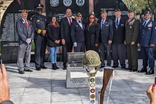 Tracy veterans and civic leaders in front of the Tracy War Memorial on Memorial Day