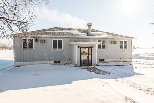 a multifamily complex in a snow blanketed state