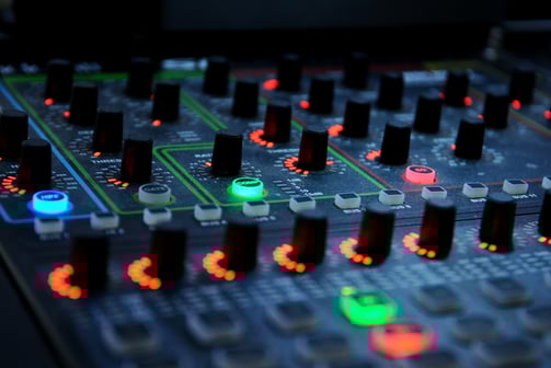 a sound mixing console with a multicolored sound
