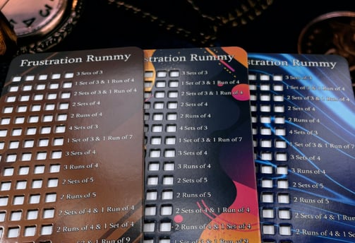 Image including all 3 designs of our base Frustration Rummy Cards