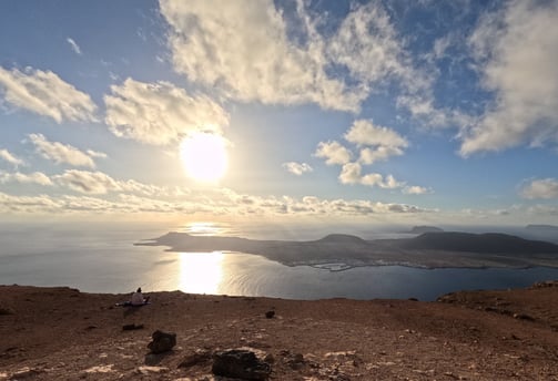 the island of la graciosa from mirador del rio in the sunset