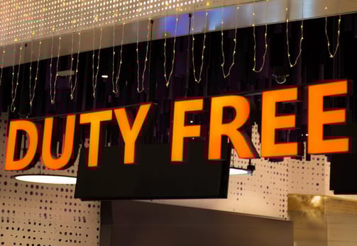 a sign that says duty free on a storefront