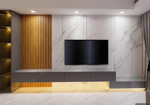 a tv screen mounted on a wall in a living room