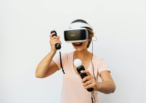 woman smiling and playing VR