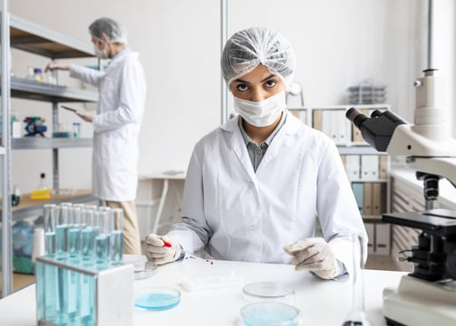 Researcher performing test in lab