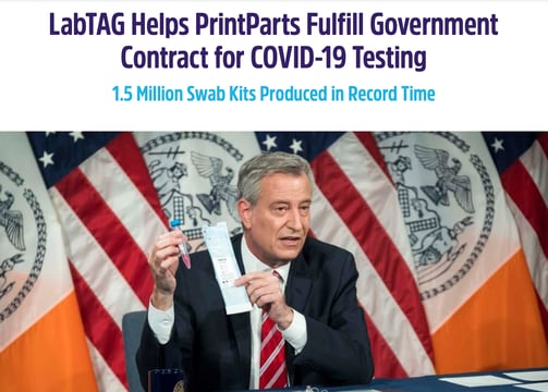 Case study image of former NYC mayor Bill DeBlasio holding LabTAG product.