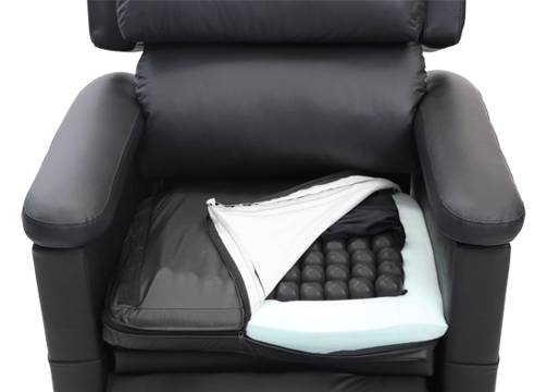 A riser recliner in black wipe clean fabric that can have any seat cushion embedded in it