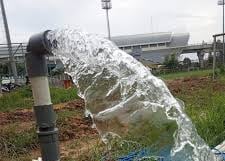 a water pipe with a hose attached to a pipe