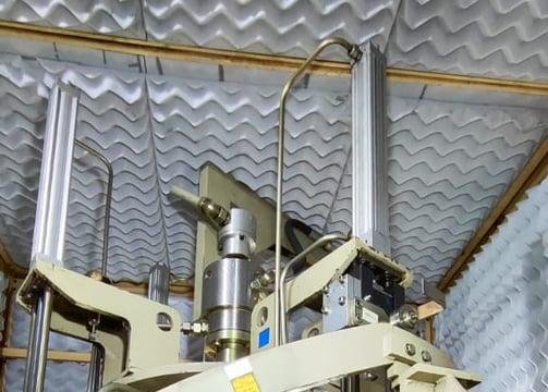 a machine that is making a paper bag